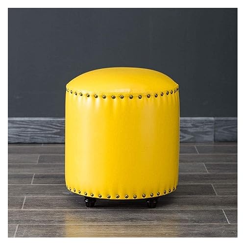 Repose-pieds en cuir rond pour soulager les jambes lourdes au salon avec style