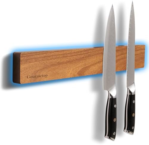 Light acacia wood magnetic knife strip, a long narrow bar with visible wood grain, shown against a plain background