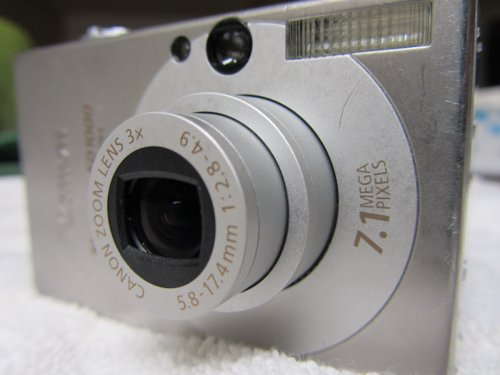 Canon PowerShot SD1000 7.1MP Digital Elph Camera 3x Optical Zo