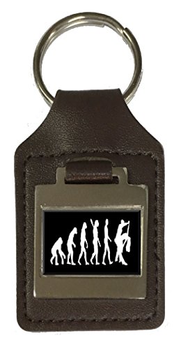 Porte-clés en cuir gravé évolution singe danseuse accessoire de maroquinerie artisanale