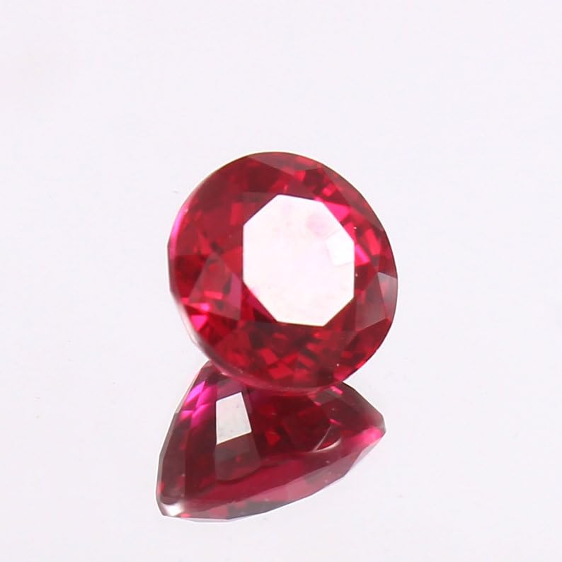 Rubis naturel rond 9mm à facettes pour la création de bijoux d'exception