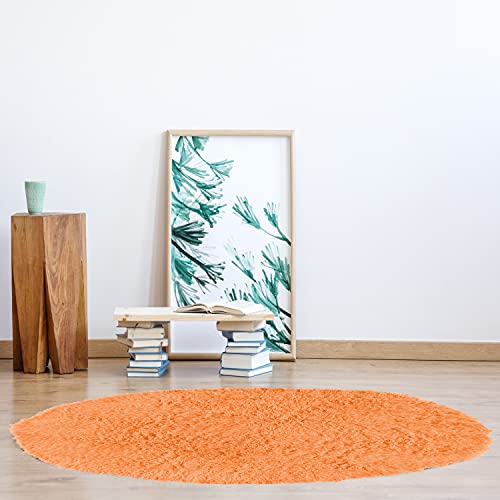 Tapis rose Linon Home Décor aux finitions soignées