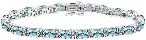 Jewelili Sterling Silver 7x5MM Oval Cut Swiss Blue Topaz and Natural White Round Diamond Accent Tennis Bracelet, 7.25"