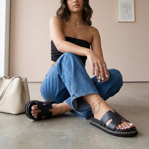 Image of CUSHIONAIRE Crisp Women's Slide Sandal - Faux Leather Cutout Slip-On with Artisan Stitching & Memory Foam, Wide Widths Available