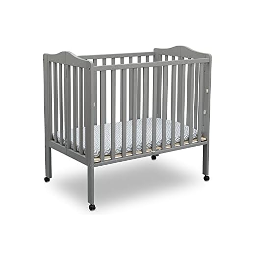 Folding Mini Baby Crib for Small Spaces