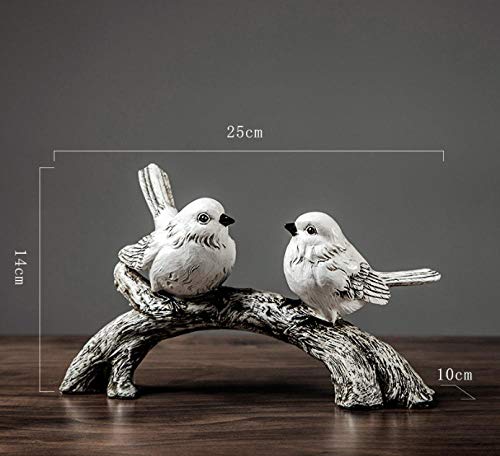 Figurine oiseau sur branche pour rompre la monotonie de votre intérieur