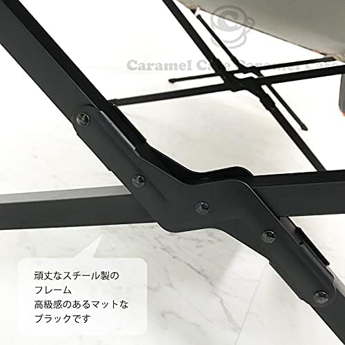 Close-up of the cot's steel X-frame joint, highlighting the sturdy construction.