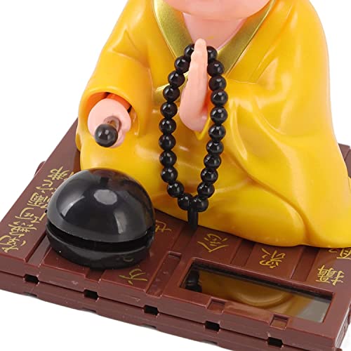 Image of AUGEN Small Buddhist Monk Solar Ornaments, Automatic Nodding Lucky Meaning Light Energy Sensing Eco Friendly Solar Buddhist Monk Statue Decoration for Home Car Dashboard (Pack of 1)(D, Yellow)