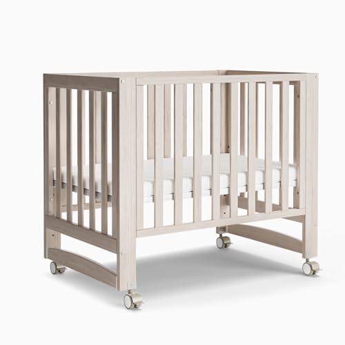 EvoNest Baby Crib, 6 in 1 Convertible Mini Crib with Wheels, 100% New Zealand Solid Wood Growing...