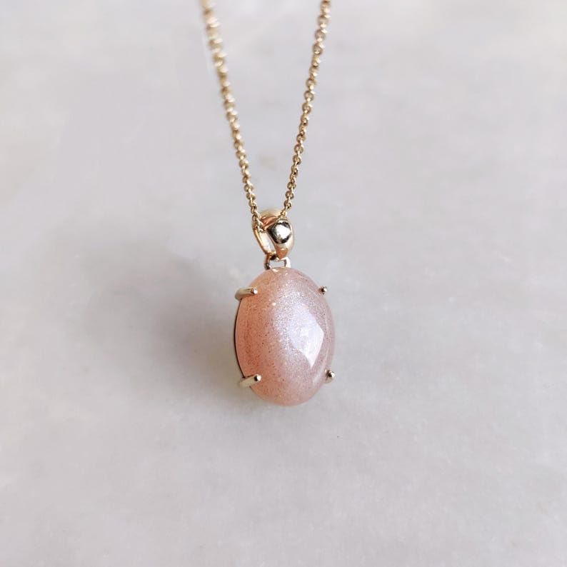 Pendentif pierre de lune pêche LKBEADS pour éveiller votre énergie