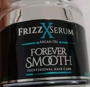 FRIZZ-X HAIR SERUM FOR ALL HAIR TYPES. LIGHT WEIGHT. WOULD NOT CHANGE THE HAIR COLOR. AMAZING NEW PACKAGING (SILVER)