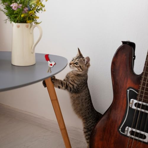Juguetes interactivos para gatos con campana que activan el ejercicio 7
