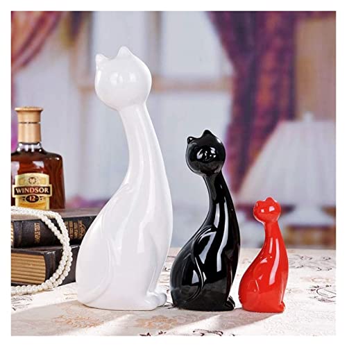 Accessoires de maison trois chats pour embellir un salon vide