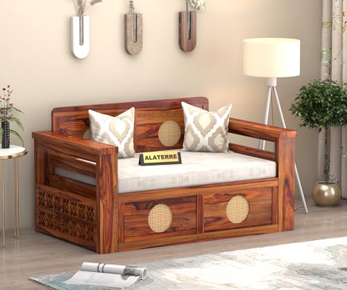 Image of ALATERRE HOME FURNITURE Solid Sheesham Wood Two Seater Sofa Cums Bed with Cane Design Panels | 2-in-1 Wooden Daybed with Cushion & Storage Drawers (Honey Finish)