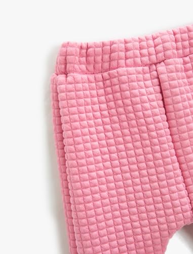 Sweatpants petites filles rose pour éviter les ceintures trop serrées