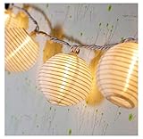 Die Lampion Lichterkette schafft durch die warme Farbe der LEDs ein gemütliches Ambiente