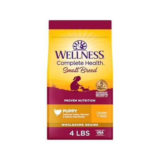 Wellness Complete Health Small Breed Dry Dog Food with Grains, Natural Ingredients, Made in USA with Real Turkey, For Dogs Up to 25 lbs. (Puppy, Turkey, Salmon & Oatmeal, 4-Pound Bag)