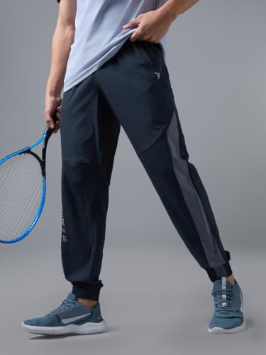 Image of TECHNOSPORT Men's Regular Fit Joggers with Zip Pockets, TECHNOLITE Quick Dry Stretchable Lightweight Track Pants for Gym Running and Casual Wear