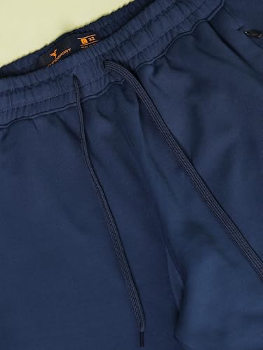 Image of TECHNOSPORT Men's Slim Fit Track Pants with Zip Pockets, ELASTO Plus Quick Dry Stretchable Lightweight Lower for Gym Running Yoga and Sports