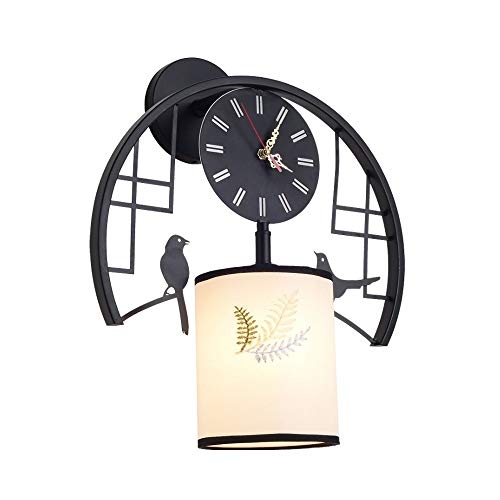 Horloge murale lumineuse LED noire pour éclairer un couloir sombre