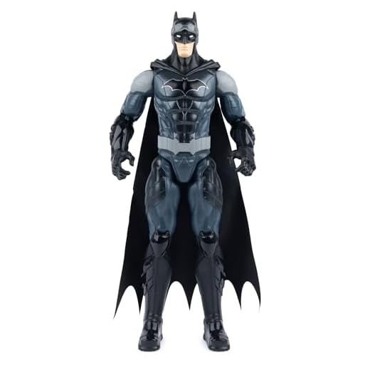 DC COMICS | Batman | Figura Batman en Escala 30 cm con Adornos Originales y Armadura Combact Azul, Capa y 11 Puntos de articulación - Juguetes para niños y niñas a Partir de 3 años