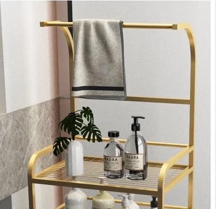 Toallero de pie dorado para un baño ordenado y libre de humedades con cesta de ropa integrada 4