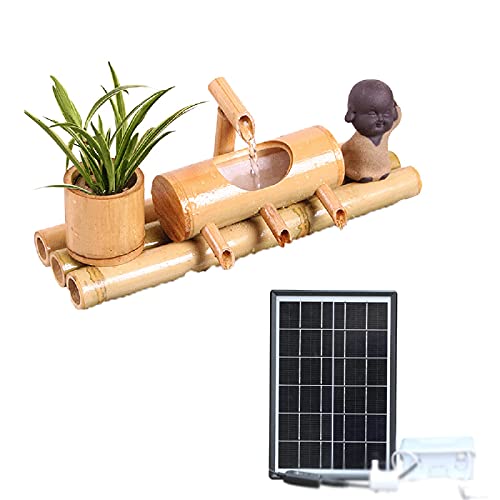 Réservoir d'eau qui coule en fontaine solaire pour apaiser votre jardin