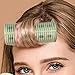 Pequeño rizador de pelo eléctrico Imagen de Pequeño rizador de pelo eléctrico