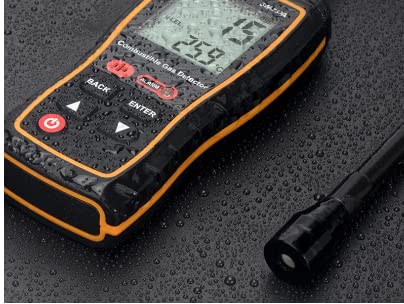 SW-733A gas detector on a wet, dark surface, indicating water resistance