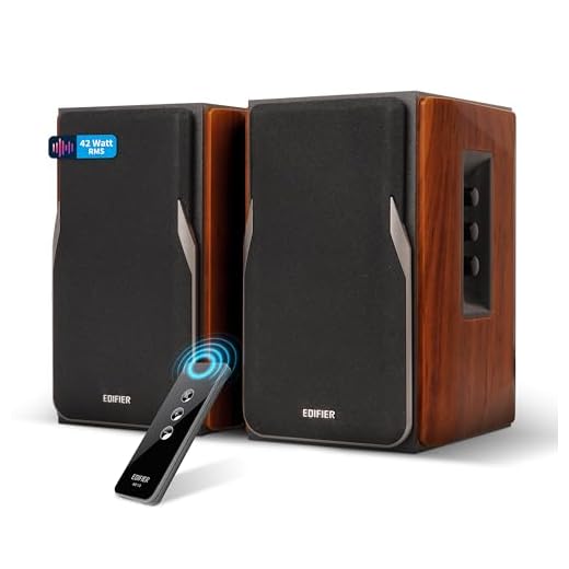 EDIFIER Studio R1380T 2.0 Regallautsprecher-System (42 Watt) im Echtholzgehäuse (MDF). Zwei LINE IN Anschlüsse. Infrarot-Fernbedienung und seitliche Bedienelemente für Bässe, Höhen und Lautstärke.