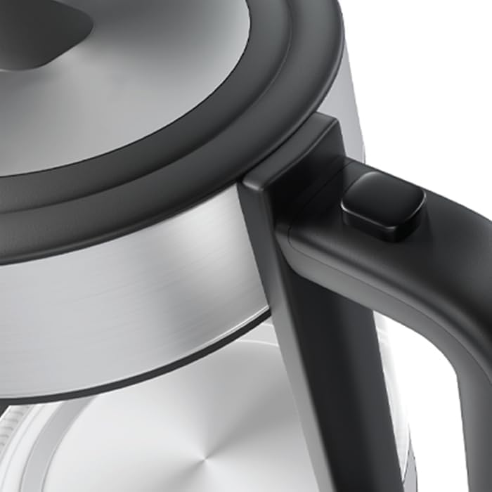 Close-up of the Mienta kettle's lid release button on the handle