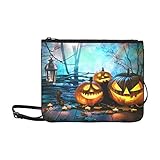 Wristlet-Tragegriff und verstellbarer Schultergurt für bequemes Tragen.