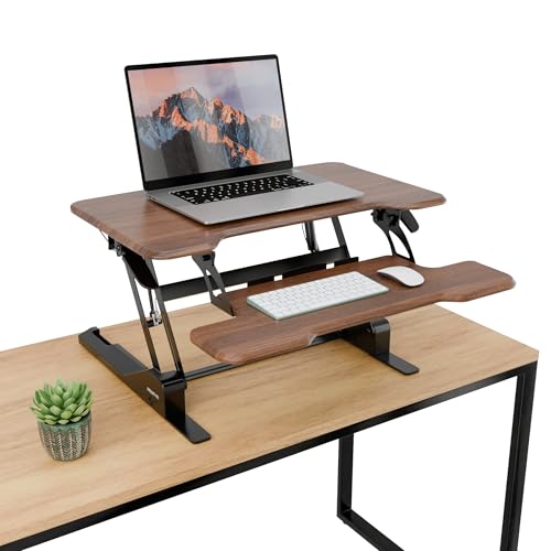 Image of Mount-It! Height Adjustable Standing Desk Converter, Compact 30 inch Wide Tabletop Standing Desk Riser with Gas Spring, Desktop Stand Up Workstation with Keyboard Tray Fits Monitor or Laptop, Dark Walnut