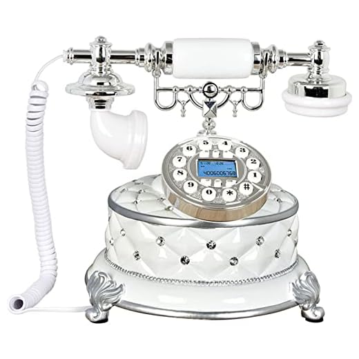 Klassisk vintage stationär trådbunden kontorstelefon Antik fast telefon för äldre telefon Klassisk retro vit vintage fast bordstelefon gjord av harts Hemmakontor