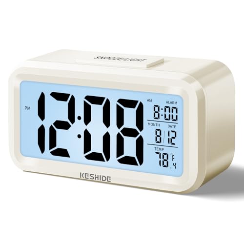 KESHIDE Night Light Digital Alarm Clock Battery Operated with Indoor Temperature, Desk Small Clock,Snooze Model,12/24H Display for Bedrooms Heavy Sleepers Kids Travel Bathroom (White)