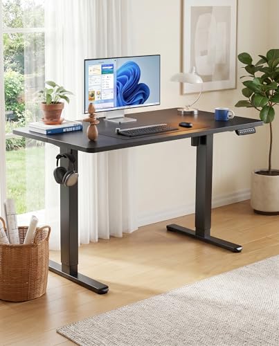 Image of HUANUO Electric Standing Desk, Height Adjustable Desk, 4 Memory Height Settings, Black Sit to Stand Up Desk for Home Office, with Headphone Hook, Cable Manager