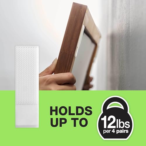 Image of FrogTape reMOVEables Medium Picture Hanging Strips- 12 Pairs - 12lbs per 4 Pairs - Damage-Free Removeable Adhesive Wall Strips Picture Hangers for Mounting Frames, Canvas, Home Decor White (24 Pieces)