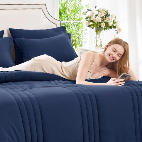 Image of CozyLux Queen Comforter Set Navy Blue - 7 Pieces Bed in a Bag, Modern Vertical Quilted Room Decor, Soft All-Season Bedding Gift with Comforter, Sheets, Pillowcases & Shams