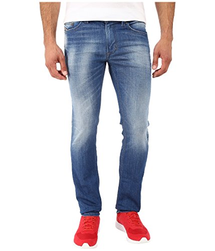 caratteristiche: Modello: Thavar 0855G Materiale: 98% cotone / 2% spandex Lavabile in lavatrice Taglio: magro sottile dettagli: Nuovi jeans a cinque tasche di Diesel Chiusura con chiusura a cerniera e logo in rilievo Grande qualità, ottima vestibilità Nella tasca della moneta e sopra la tasca posteriore destra il logo patch Tutti i rivetti hanno la sigla del logo Diesel