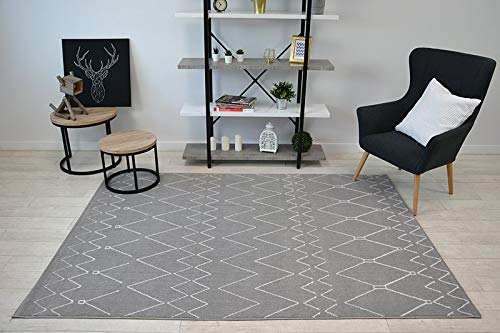 Tapis ethnique zigzag blanc et argenté pour réchauffer un sol froid
