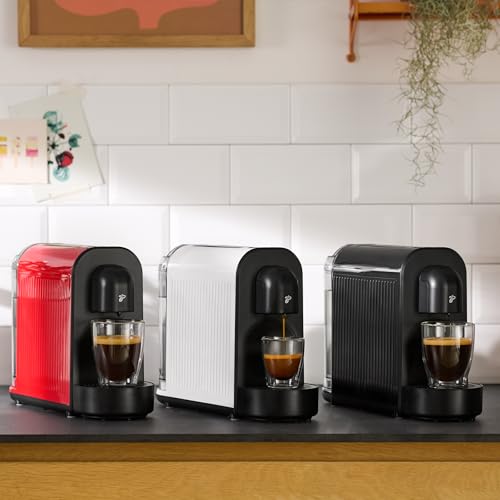 Foto von Tchibo Cafissimo NOW Kaffeemaschine Kapselmaschine inkl. 30 Kapseln für Caffè Crema, Espresso und Kaffee | 0,67 l | 1250 Watt | 11,4 x 33,7 x 23,5 cm | Schwarz