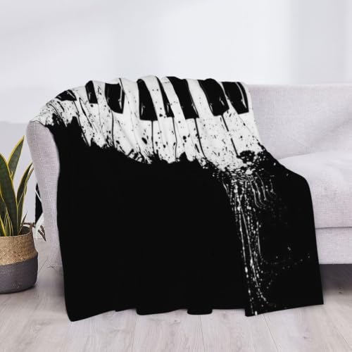 Couverture en flanelle piano 200x150 cm douce et chaude pour canapé