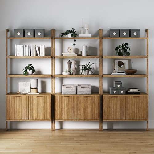 Set of three Nathan James Jasper solid wood bookshelves in a light brown finish.