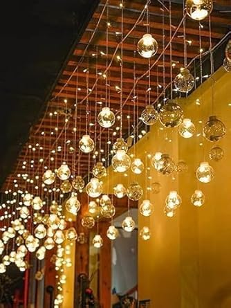 Image of V.E.S.P.A 12-Ball String Lights with 8 Flashing Modes - Perfect for Indoor & Outdoor Decoration - Ideal for Diwali, Christmas, and New Year. (Warm White)