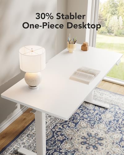 Image of HUANUO Electric Standing Desk, Whole Piece Desktop, Adjustable Height Computer Desk, 4 Height Memory Settings, Sit Stand Up Desk for Home Office, 55 inch x 27 inch, White