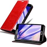 samsung galaxy note 12 FUNCIÓN: La funda tiene un compartimiento para tarjetas y una puerta frontal magnético. Todas las opciones del teléfono se pueden utilizar sin inconveniente; las teclas y los botones son de fácil alcance y los conectores quedan libremente accesibles (cámara, auriculares, etc.) El teléfono se inserta en la carcasa de plástico pegada a la funda y se puede quitar fácilmente, cuando sea necesario.