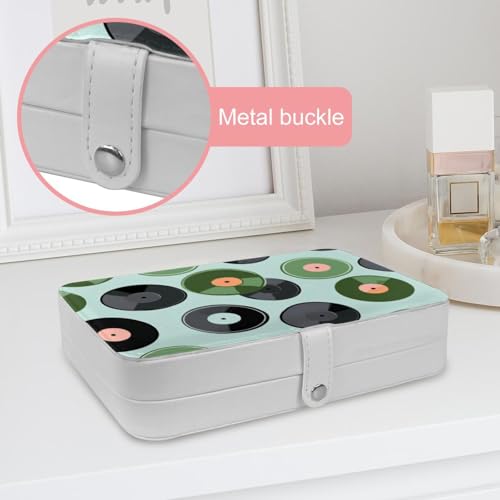 Boîte à bijoux de voyage avec boucle métal et compartiments bagues