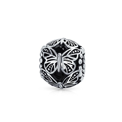 Abalorio de mariposa retro en plata de ley para llevar en tu look diario