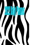  2022 Daily Planner Agenda with a zebra print. 6x9 365 days 7 days a week on each page paperback. Time management, increase productivity, and ... list and notes on each page. Habit builder.
