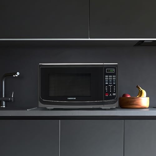 Farberware FM11BKA Kompakter Mikrowellenherd für 1.1 Cu Arbeitsplatte, 1100 W mit LED-Beleuchtung, Kinderschloss, graue, pflegeleichte Innenseite, Schwarz